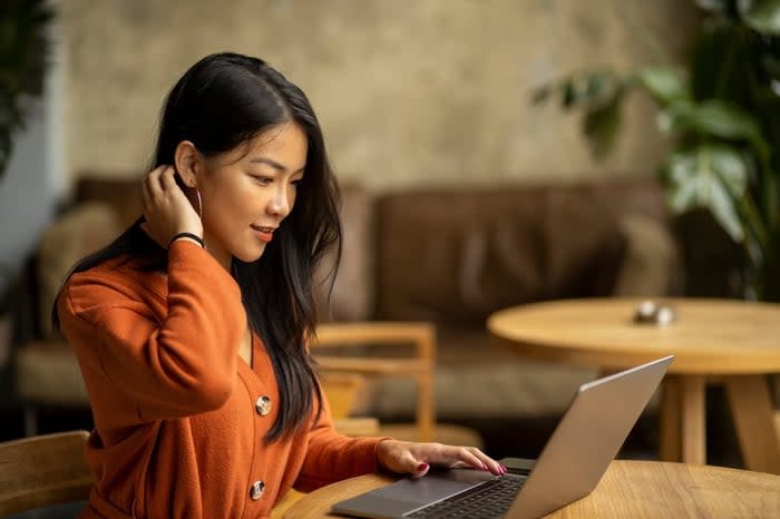 Young woman using her laptop.