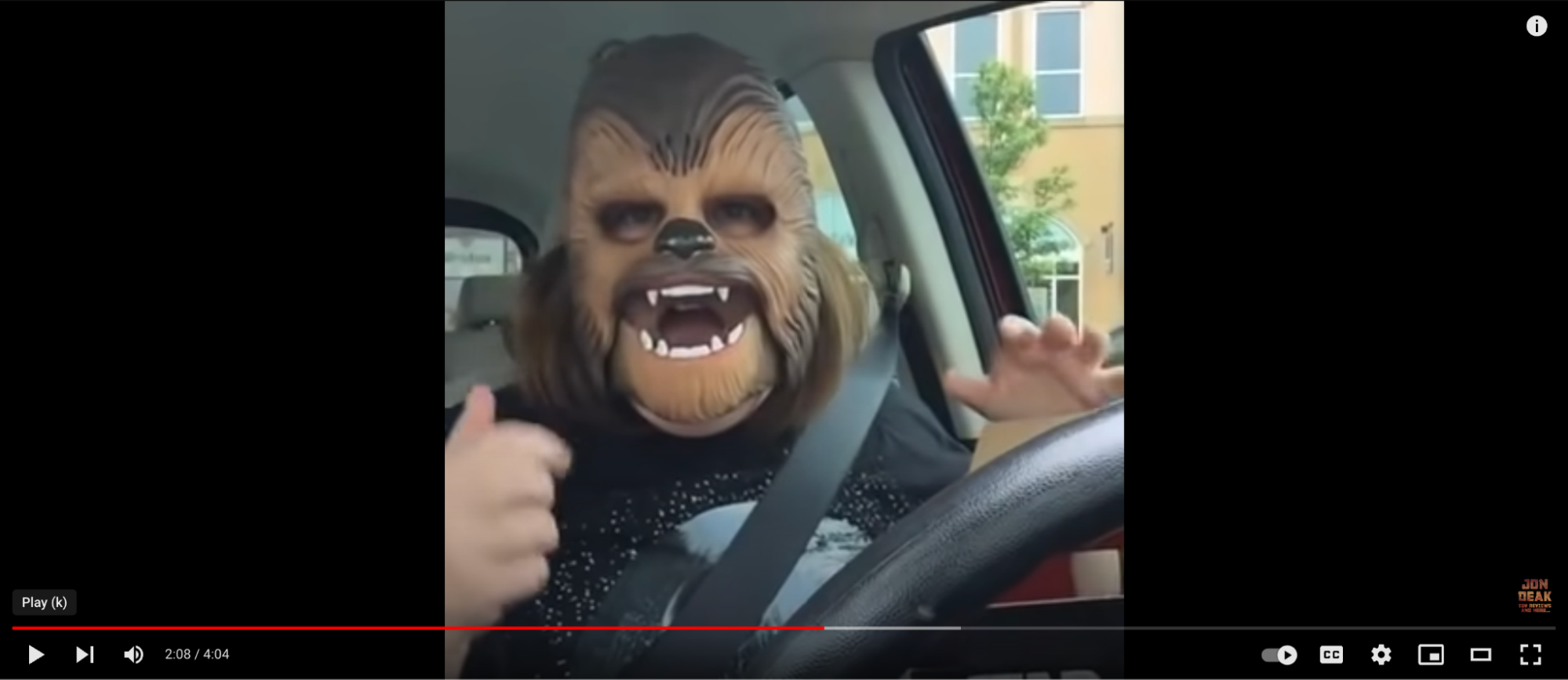 a woman in a chewbacca mask on youtube video