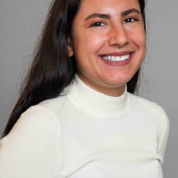 Sophia Acevedo's face against a gray background